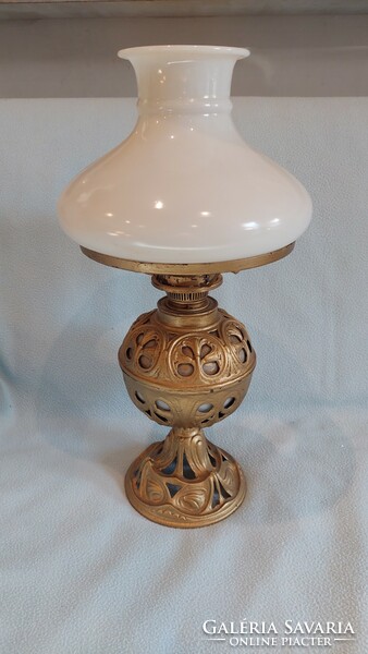 Old kerosene lamp with milk glass cover