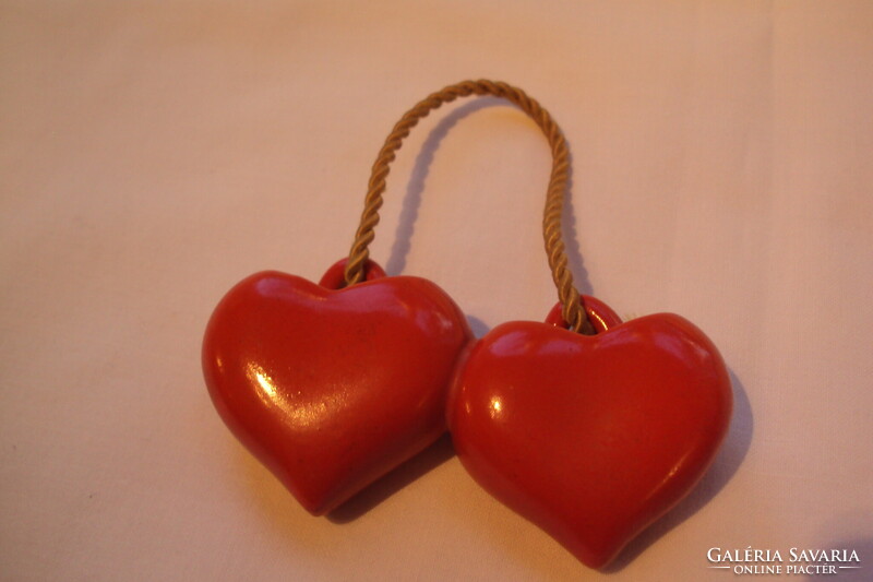 Double double, can be hung on the wall, red ceramic heart....Small flowers can be placed inside....Together ea.