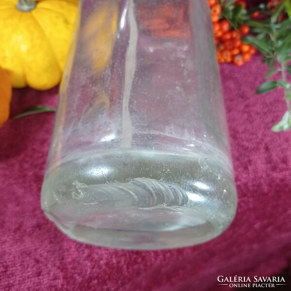 Old one-liter soda bottle, dropper