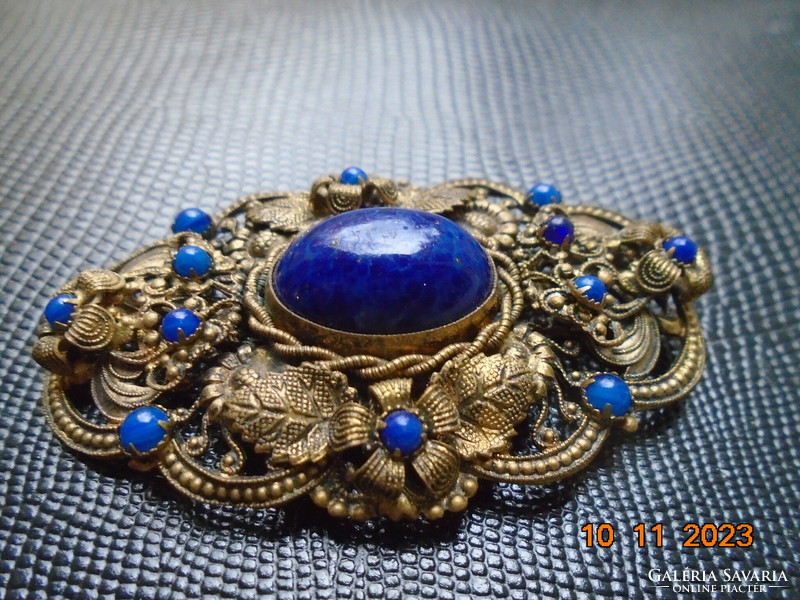Antique gold-plated filigree spectacular brooch with polished lapis lazuli stones