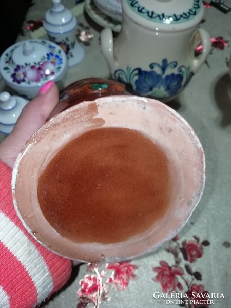 Ceramic jug is in the condition shown in the pictures