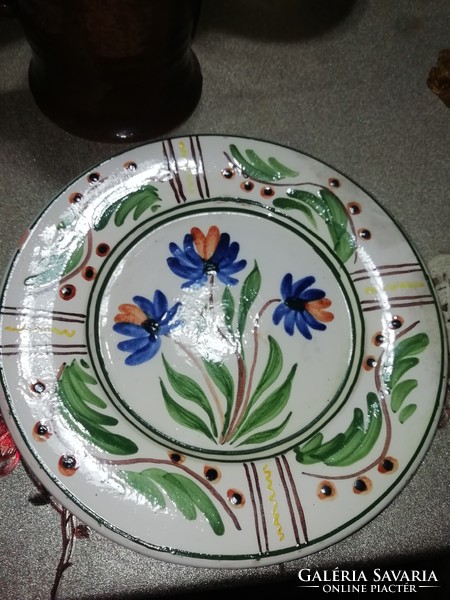 Ceramic plate 62. It is in the condition shown in the pictures