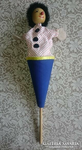 Old children's toy on a wooden stick, stick doll, doll