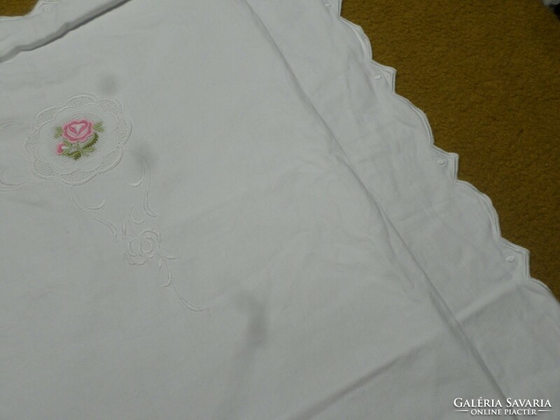 Embroidered, floral, monogrammed pillowcase.