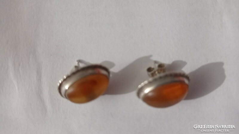 Old silver-colored vintage earrings with translucent yellow decoration, antique jewelry