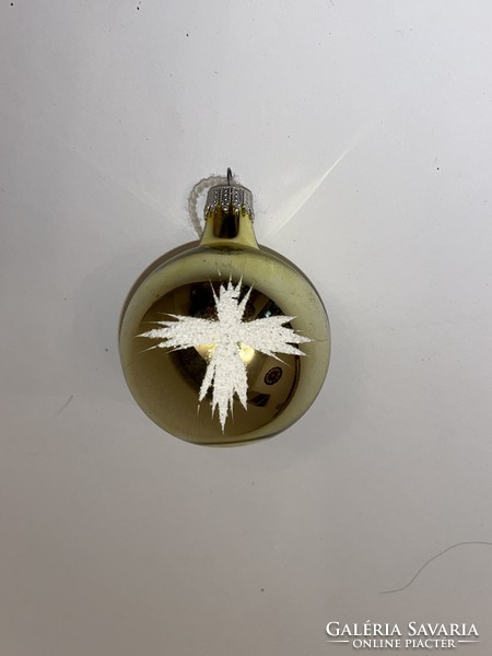 Old glass sphere Christmas tree ornament with snowy pattern