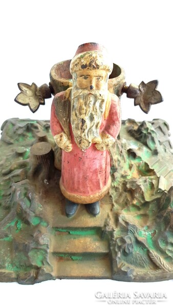 Antique 1919s cast iron Christmas tree base with Santa putt!