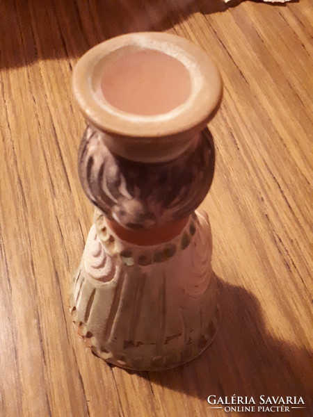 A slightly pink marked candle holder