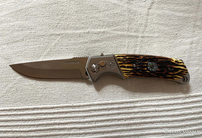 Spring-loaded knife with built-in compass + field pattern case