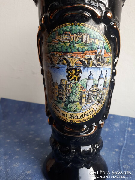 German brown glazed ceramic beer mug with plastic surface