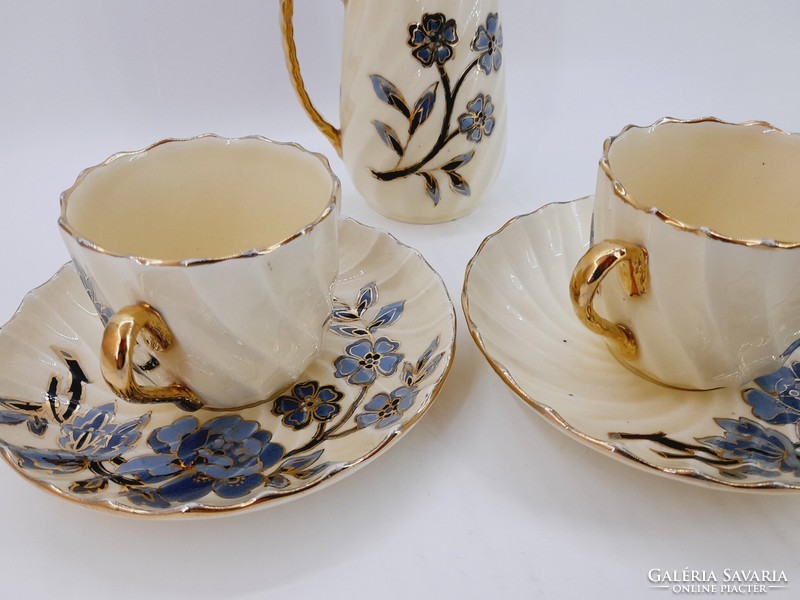 Pair of antique earthenware cups and spouts