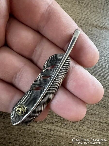 Navajo silver feather pendant