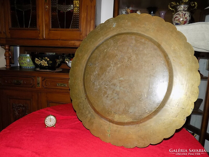 A huge Chinese bronze or copper bowl with a dragon