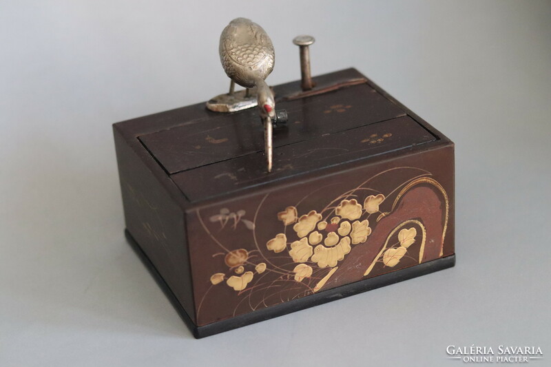 Antique Japanese lacquer gold painted cigarette dispenser