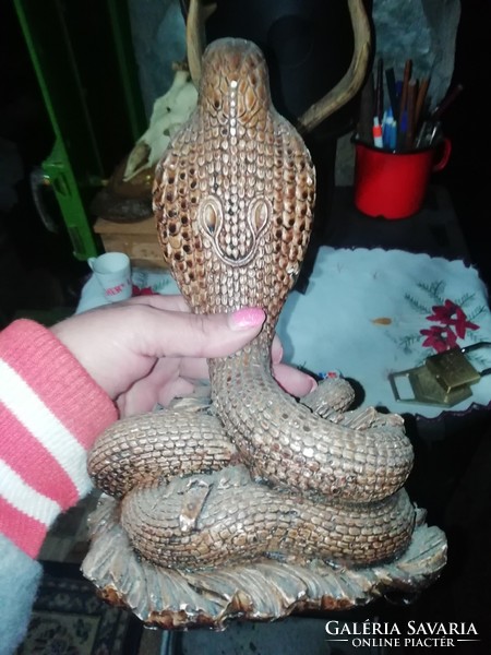Cobra plaster statue is in the condition shown in the pictures