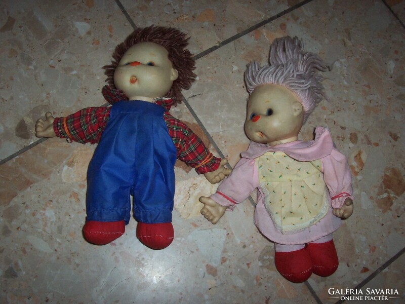 Boy and girl in an old doll pair