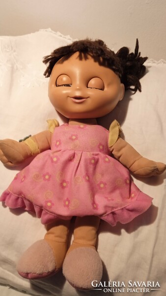 This little rag doll is very dirty but it talks and sings, 33 cm