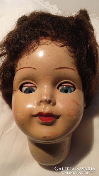 Antique doll head even just for the moving eyes