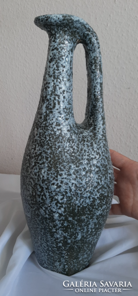 A large retro ceramic vase with a wonderful shape is probably from a plague cold well