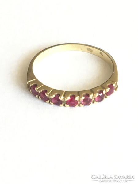 Women's gold ring with ruby gemstone