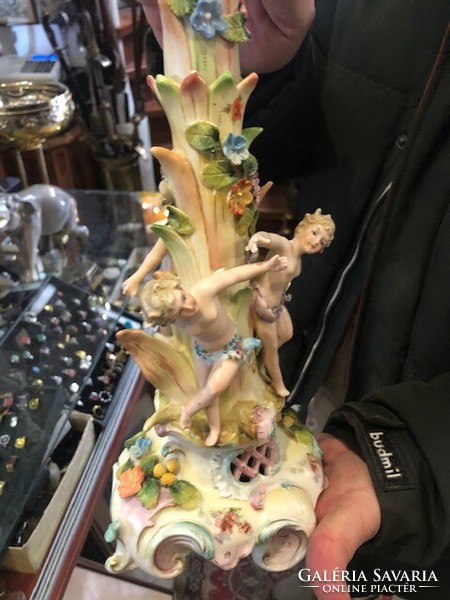 German porcelain candle holder, xix. Century, 36 cm high.