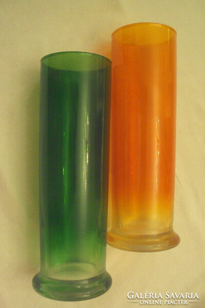 Two colorful (green-orange) glass vases with rimmed bases together.