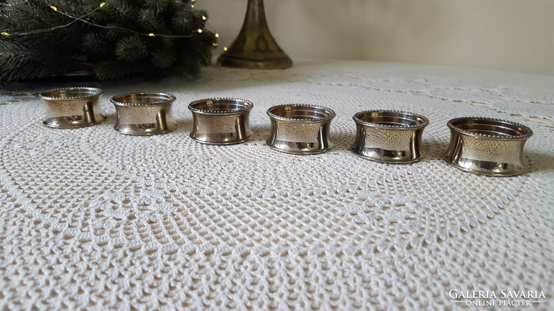 6 beautiful, silver-plated napkin rings