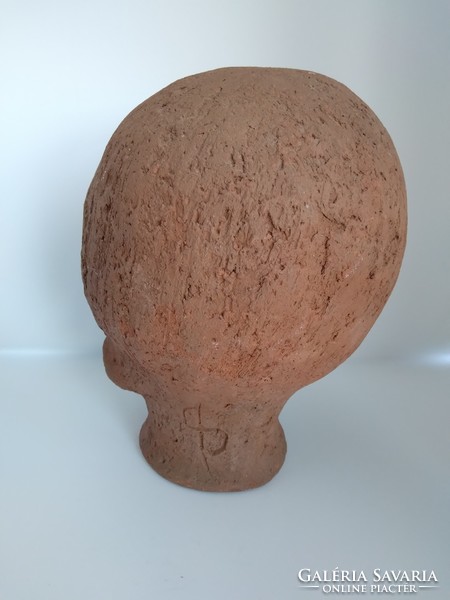Art deco terracotta female head