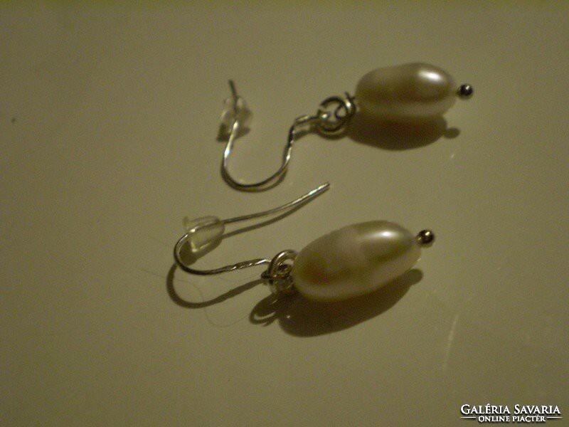 For half! Real leather. Pearl earrings