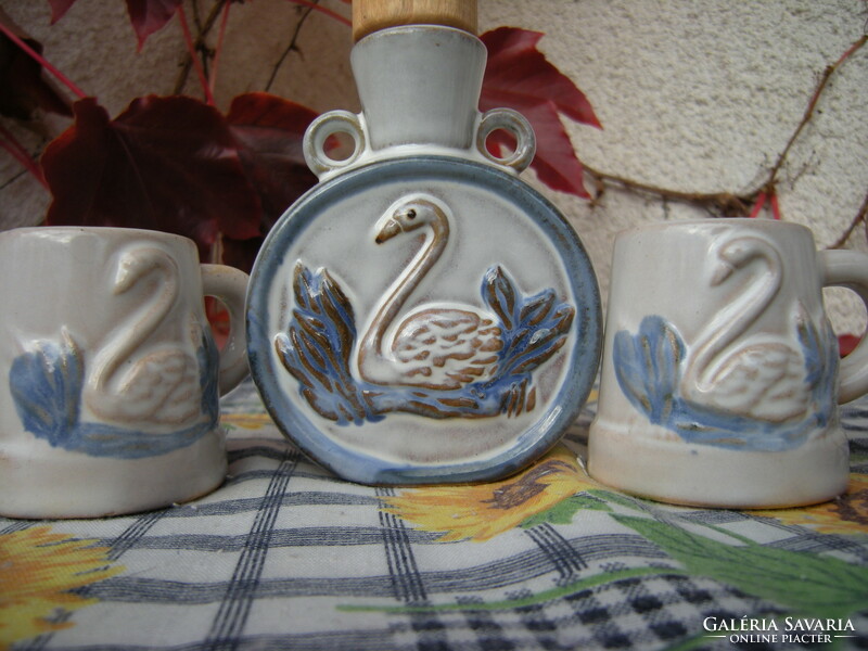 Glazed ceramic boutique with two halves of a bowl with swan decor, Blauer Schwan ceramics
