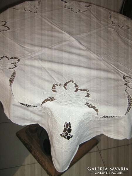 Beautiful special white rosette tablecloth with a Christmas pattern in the four corners