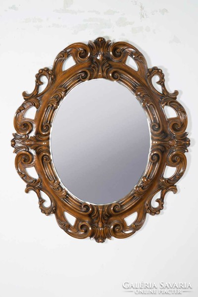 Carved wooden framed round mirror - with tendril decor