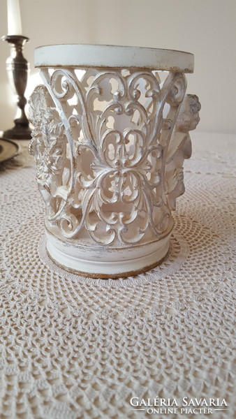 Beautiful openwork angel-shaped candle holder, candle holder or storage