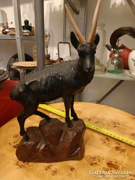 Carved wooden statue of a big chamois of the Black Forest