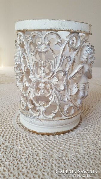 Beautiful openwork angel-shaped candle holder, candle holder or storage