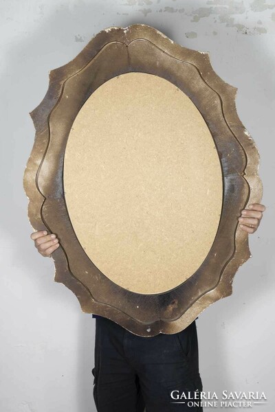Oval mirror with gilded wooden frame
