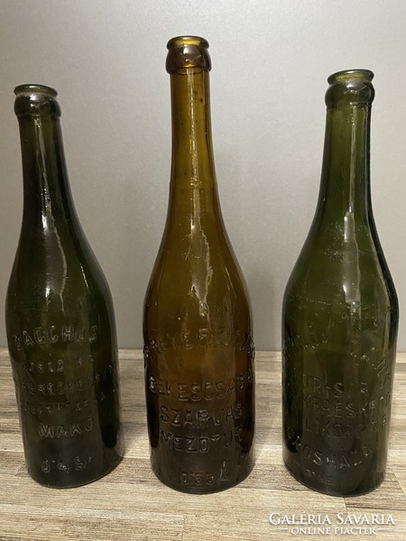3 old beer bottles