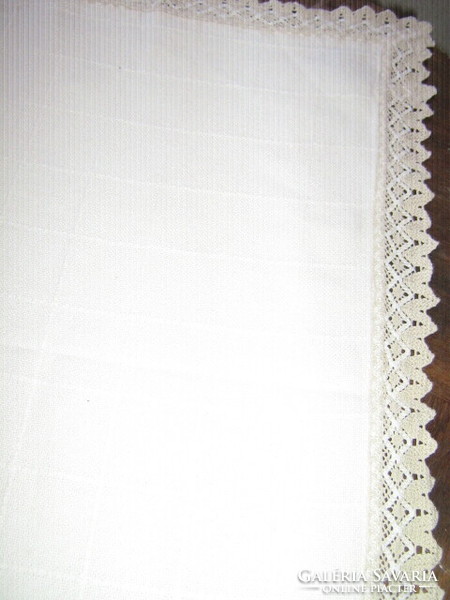 Beautiful elegant woven tablecloth with lacy edges