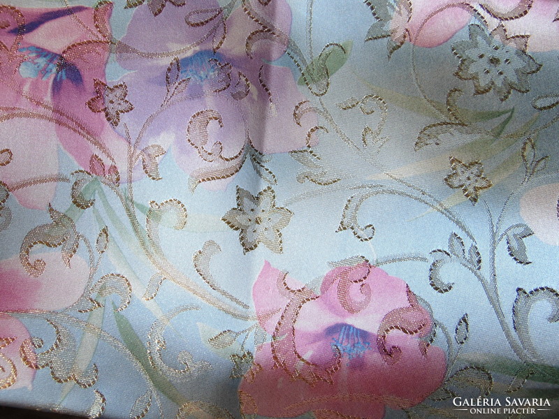 Beautiful floral / festive tablecloth in pastel colors