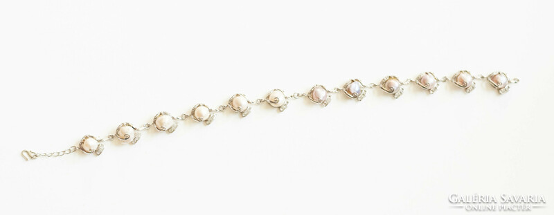 Cultured baroque pearls encased in white gold-colored jewelry - necklace