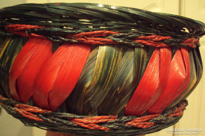 Lacquered storage basket made of green and red cane. (For sewing, yarn----flowers)