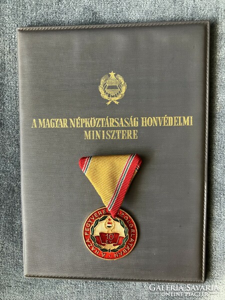 Service medal after 10 years with awarding document