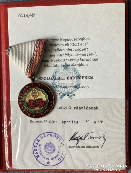 Service medal after 25 years with awarding document
