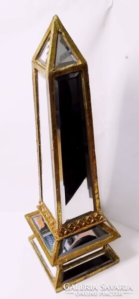 A gilded mirror obelisk from Switzerland. Special decoration