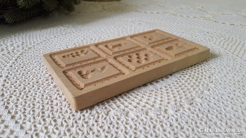 Hand-carved wooden gingerbread press