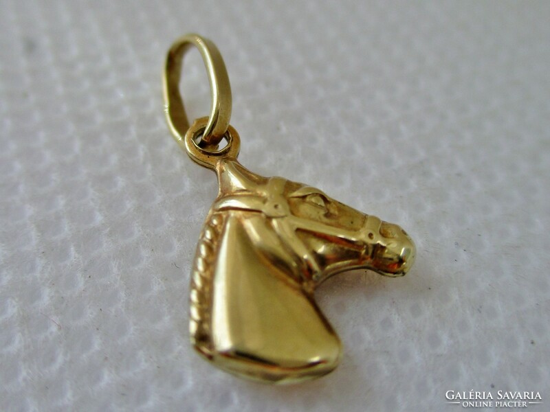Beautiful old 14kt gold horse pendant