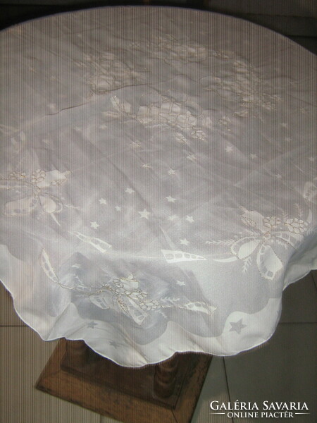 Christmas tablecloth embroidered in beautiful white material with gold threads