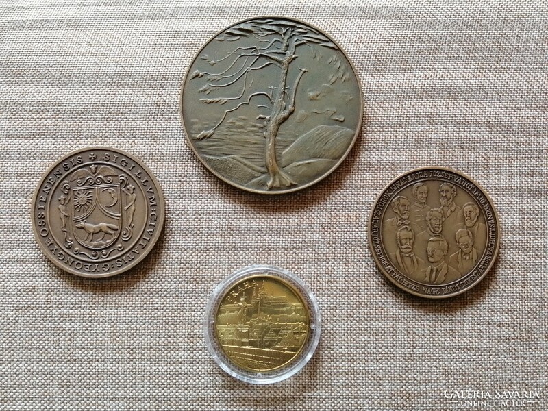 Four commemorative coins
