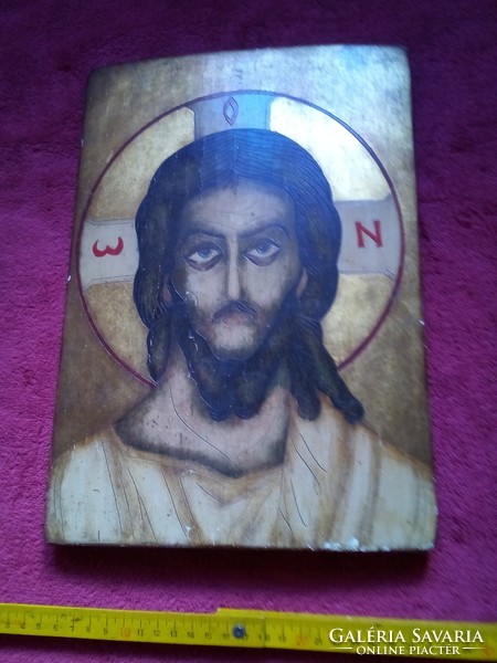 Christ icon on wooden board