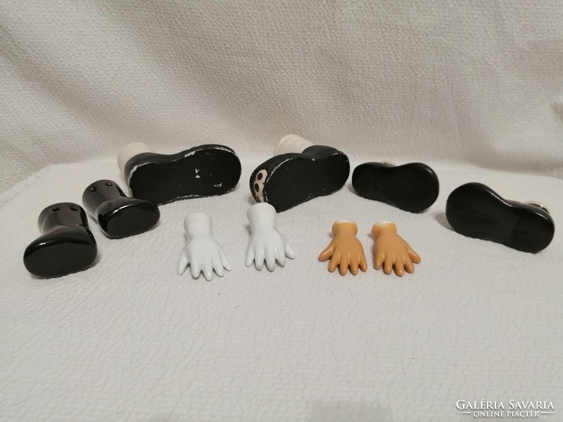 Ceramic clown parts, hands, shoes, in a package
